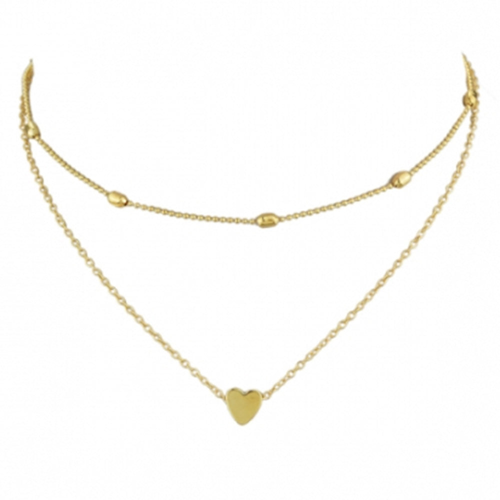 The beautiful Kelabu gold heart charm necklace and choker set pictured on a plain white background