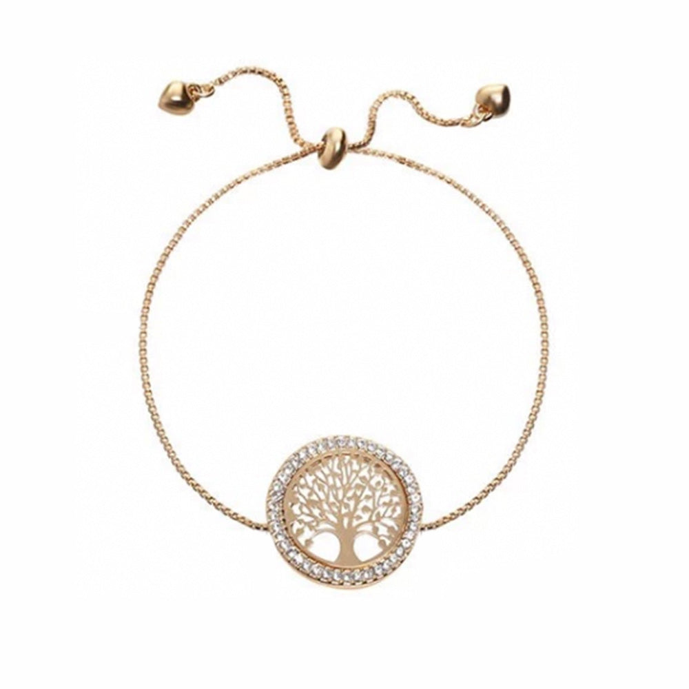 The gold tree bracelet from Kelabu featuring a delicate tree of life design with dazzling diamonds around the outer circle and a stylish tie fastening