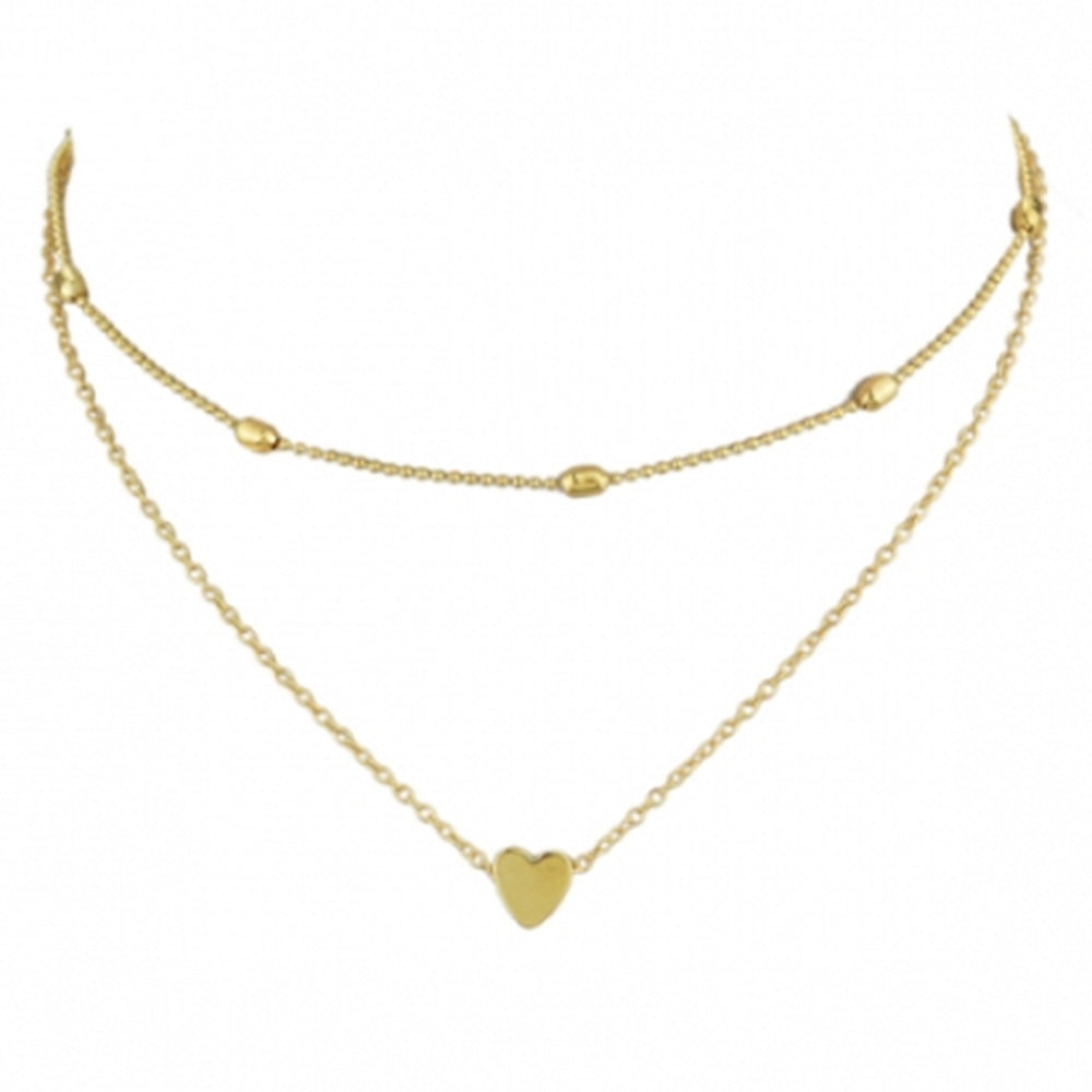 The beautiful Kelabu gold heart charm necklace and choker set pictured on a plain white background 