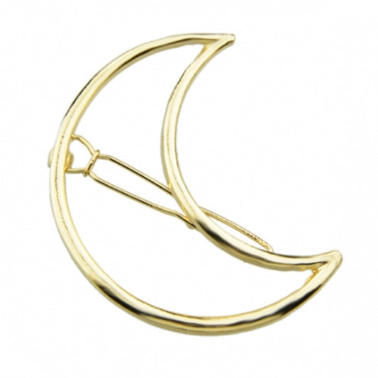 Close up image of the Kelabu cut out moon hair clip in Gold