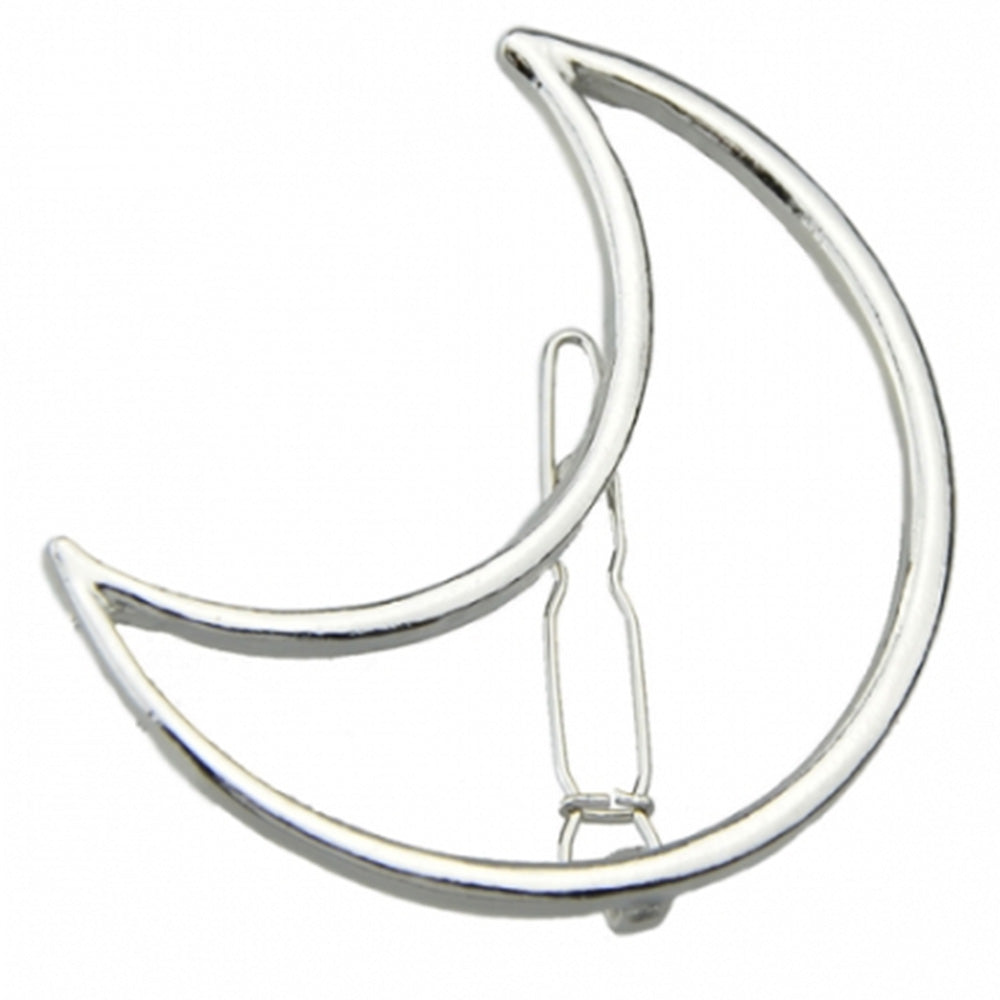 Close up image of the Kelabu cut out moon hair clip in Silver
