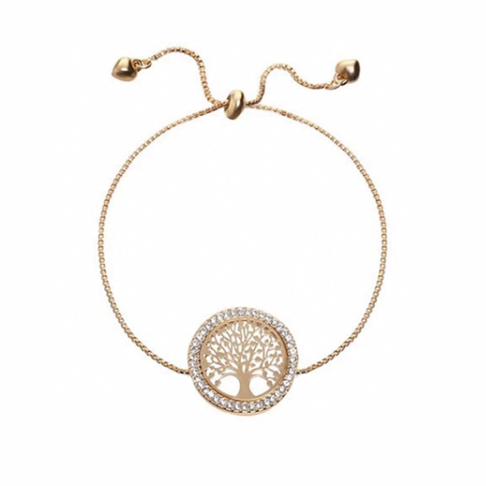 The gold tree bracelet from Kelabu featuring a delicate tree of life design with dazzling diamonds around the outer circle and a stylish tie fastening  